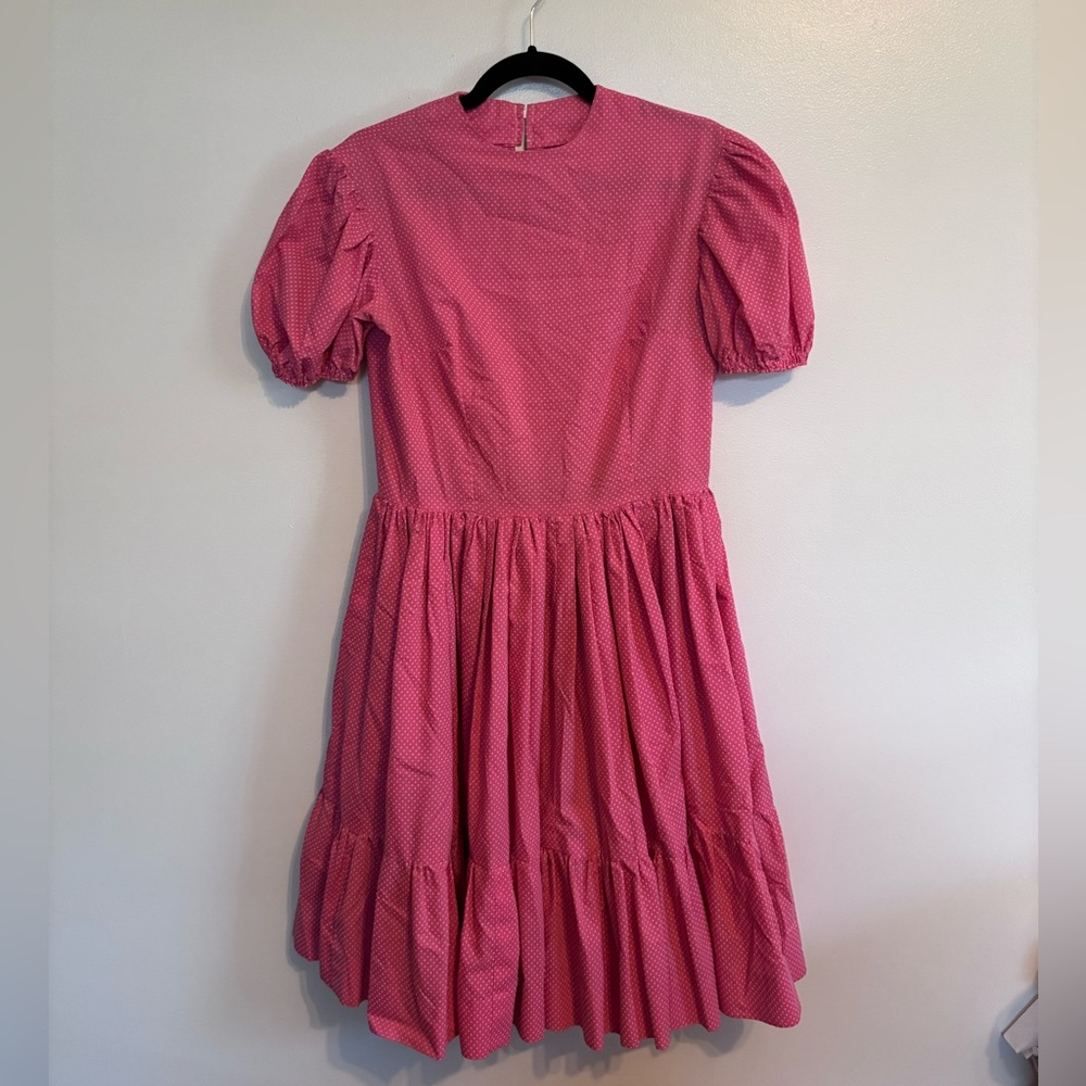 Vintage handmade square dance dress in a pink red with small white polka dots.